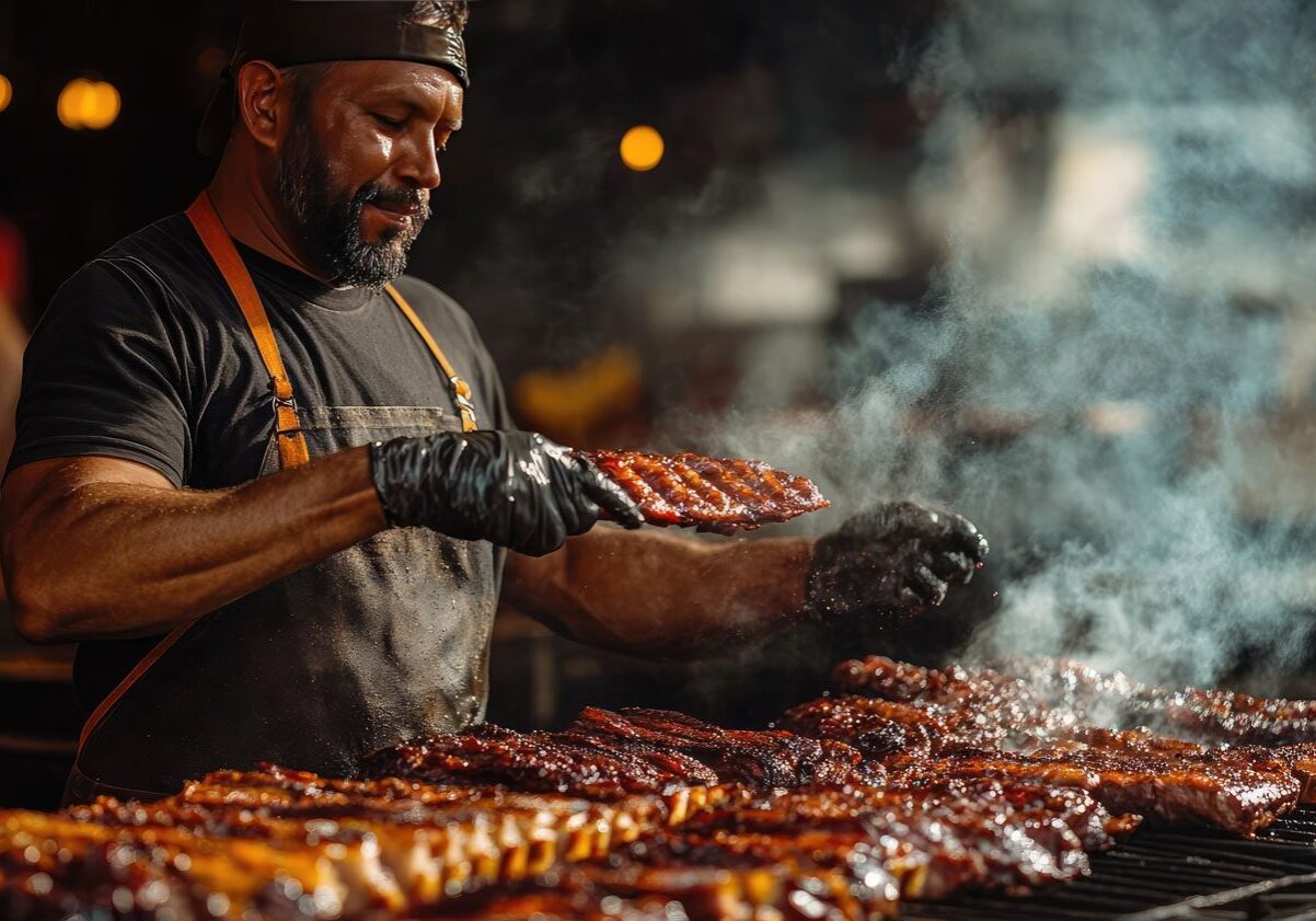 A pitmaster tending to a smoker full of meats, highlighting the a pitmaster tending to a smoker full of meats, highlighting the